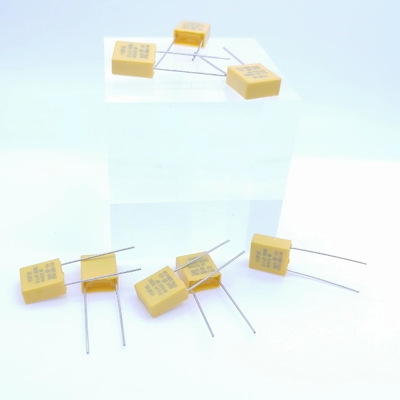 خازن کاهش فشار مقاومتی و خازنی 0.1UF 310V P7.5MM رنگ زرد